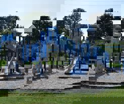 A playground in a park.