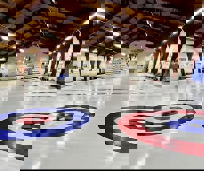 The inside of a curling rink.